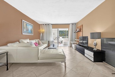 Updated and furnished 2 bed/2 bath unit. Open kitchen, shaker on Wynmoor Golf Course in Florida - for sale on GolfHomes.com, golf home, golf lot