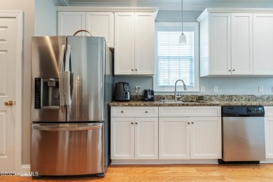 This charming, well maintained 4BR/3BA is located on a quiet on Carolina National Golf Club in North Carolina - for sale on GolfHomes.com, golf home, golf lot