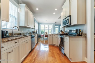 This charming, well maintained 4BR/3BA is located on a quiet on Carolina National Golf Club in North Carolina - for sale on GolfHomes.com, golf home, golf lot