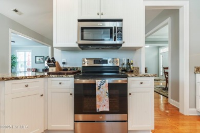 This charming, well maintained 4BR/3BA is located on a quiet on Carolina National Golf Club in North Carolina - for sale on GolfHomes.com, golf home, golf lot