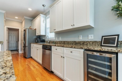 This charming, well maintained 4BR/3BA is located on a quiet on Carolina National Golf Club in North Carolina - for sale on GolfHomes.com, golf home, golf lot