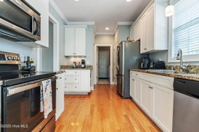 This charming, well maintained 4BR/3BA is located on a quiet on Carolina National Golf Club in North Carolina - for sale on GolfHomes.com, golf home, golf lot