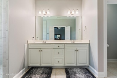 This charming, well maintained 4BR/3BA is located on a quiet on Carolina National Golf Club in North Carolina - for sale on GolfHomes.com, golf home, golf lot