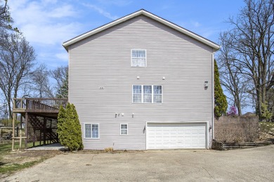 Welcome to your dream home in the serene Lake Doster community! on Lake Doster Golf Club in Michigan - for sale on GolfHomes.com, golf home, golf lot