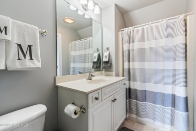 This charming, well maintained 4BR/3BA is located on a quiet on Carolina National Golf Club in North Carolina - for sale on GolfHomes.com, golf home, golf lot
