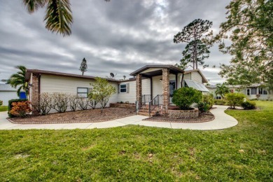 Discover the beauty of Pine Lakes Country Club with this on Pine Lakes Country Club in Florida - for sale on GolfHomes.com, golf home, golf lot