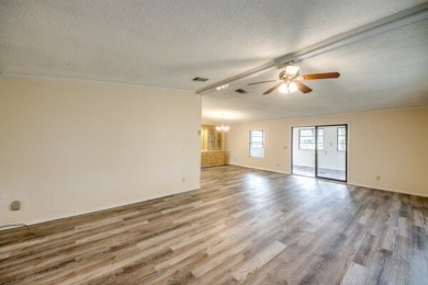 Discover the beauty of Pine Lakes Country Club with this on Pine Lakes Country Club in Florida - for sale on GolfHomes.com, golf home, golf lot