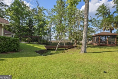 This impeccable 4BR 2BA home embraces grace and charm while on Laurel Island Links in Georgia - for sale on GolfHomes.com, golf home, golf lot