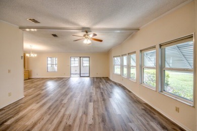 Discover the beauty of Pine Lakes Country Club with this on Pine Lakes Country Club in Florida - for sale on GolfHomes.com, golf home, golf lot