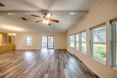 Discover the beauty of Pine Lakes Country Club with this on Pine Lakes Country Club in Florida - for sale on GolfHomes.com, golf home, golf lot