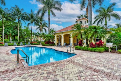 First Floor Coach Home With Serene Lake Views.  Located In The on BallenIsles Golf and Country Club in Florida - for sale on GolfHomes.com, golf home, golf lot
