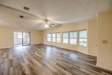 Discover the beauty of Pine Lakes Country Club with this on Pine Lakes Country Club in Florida - for sale on GolfHomes.com, golf home, golf lot