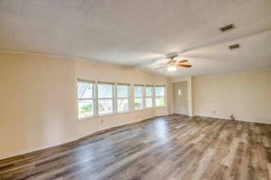 Discover the beauty of Pine Lakes Country Club with this on Pine Lakes Country Club in Florida - for sale on GolfHomes.com, golf home, golf lot