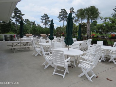 This charming, well maintained 4BR/3BA is located on a quiet on Carolina National Golf Club in North Carolina - for sale on GolfHomes.com, golf home, golf lot
