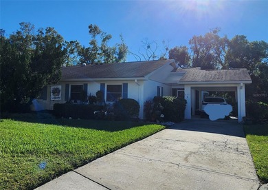 Discover the perfect blend of comfort and carefree living on Sandpiper Golf Club in Florida - for sale on GolfHomes.com, golf home, golf lot