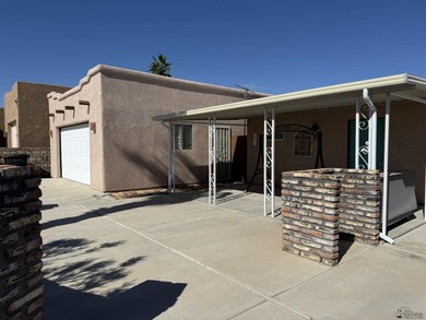 Oversize garage 12' X 30' is insulated, taped and textured with on Foothills Executive Golf Course in Arizona - for sale on GolfHomes.com, golf home, golf lot