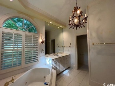 Welcome to classic Lowcountry living in the prestigious gated on Pawleys Plantation Golf and Country Club in South Carolina - for sale on GolfHomes.com, golf home, golf lot