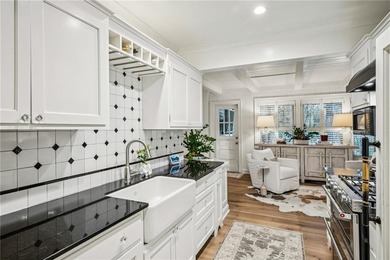 Come live near the Beltline and Tanyard Creek Park in sought on Bobby Jones Golf Club in Georgia - for sale on GolfHomes.com, golf home, golf lot