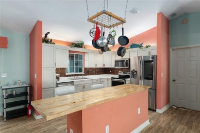 Not too large, not too small. This HOLLY model has 3 bedrooms & on Eagle Ridge At Spruce Creek Country Club in Florida - for sale on GolfHomes.com, golf home, golf lot