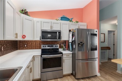 Not too large, not too small. This HOLLY model has 3 bedrooms & on Eagle Ridge At Spruce Creek Country Club in Florida - for sale on GolfHomes.com, golf home, golf lot