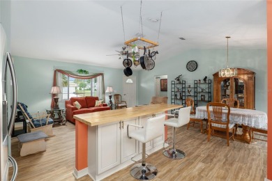 Not too large, not too small. This HOLLY model has 3 bedrooms & on Eagle Ridge At Spruce Creek Country Club in Florida - for sale on GolfHomes.com, golf home, golf lot