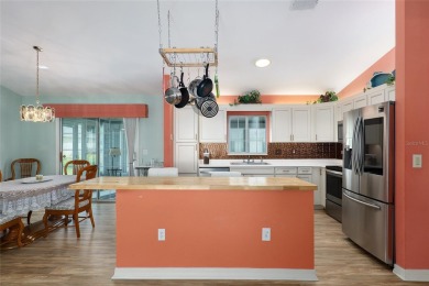 Not too large, not too small. This HOLLY model has 3 bedrooms & on Eagle Ridge At Spruce Creek Country Club in Florida - for sale on GolfHomes.com, golf home, golf lot