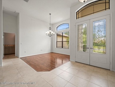 Located in Glen Lakes, this 2006 Lindhorst Custom Classique is on Glen Lakes Country Club in Florida - for sale on GolfHomes.com, golf home, golf lot