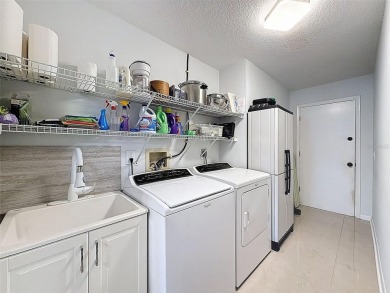 As you enter this lovely home you see Pride of Ownership on The Links Golf Course in Florida - for sale on GolfHomes.com, golf home, golf lot