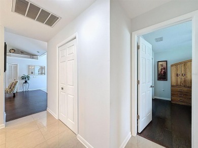 As you enter this lovely home you see Pride of Ownership on The Links Golf Course in Florida - for sale on GolfHomes.com, golf home, golf lot