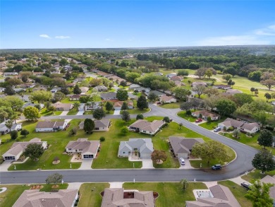 Not too large, not too small. This HOLLY model has 3 bedrooms & on Eagle Ridge At Spruce Creek Country Club in Florida - for sale on GolfHomes.com, golf home, golf lot