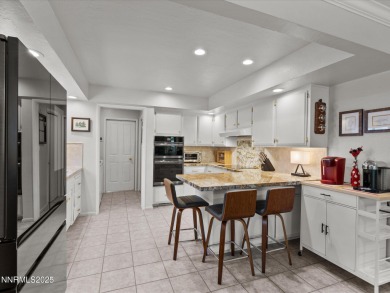 Discover the perfect blend of elegance, comfort, and natural on LakeRidge Golf Course in Nevada - for sale on GolfHomes.com, golf home, golf lot