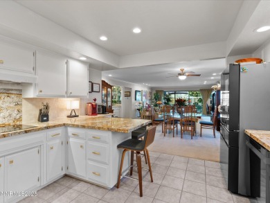 Discover the perfect blend of elegance, comfort, and natural on LakeRidge Golf Course in Nevada - for sale on GolfHomes.com, golf home, golf lot