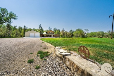 Escape to your own private sanctuary in this quaint log home on on The Briarwood in Montana - for sale on GolfHomes.com, golf home, golf lot