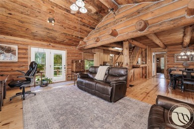 Escape to your own private sanctuary in this quaint log home on on The Briarwood in Montana - for sale on GolfHomes.com, golf home, golf lot