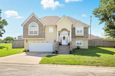 Welcome to 702 Copper Oaks Drive, a stunning 4-bedroom, 3-bath on Briarbrook Golf Course in Missouri - for sale on GolfHomes.com, golf home, golf lot
