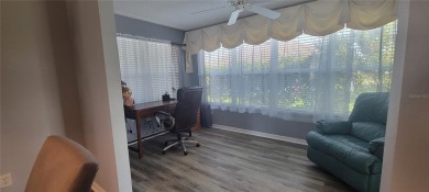 MOVE IN READY - UPGRADED - TURNKEY -GOLF CART INCLUDED- NO BOND on The Links of Spruce Creek in Florida - for sale on GolfHomes.com, golf home, golf lot