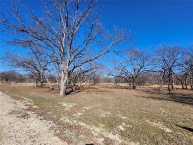 Just under an acre building site lot with mature oak trees  to on Nocona Hills Golf Course in Texas - for sale on GolfHomes.com, golf home, golf lot