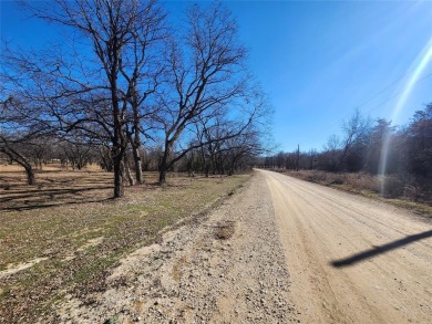 Just under an acre building site lot with mature oak trees  to on Nocona Hills Golf Course in Texas - for sale on GolfHomes.com, golf home, golf lot