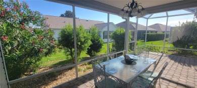 MOVE IN READY - UPGRADED - TURNKEY -GOLF CART INCLUDED- NO BOND on The Links of Spruce Creek in Florida - for sale on GolfHomes.com, golf home, golf lot
