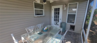 MOVE IN READY - UPGRADED - TURNKEY -GOLF CART INCLUDED- NO BOND on The Links of Spruce Creek in Florida - for sale on GolfHomes.com, golf home, golf lot