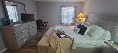 MOVE IN READY - UPGRADED - TURNKEY -GOLF CART INCLUDED- NO BOND on The Links of Spruce Creek in Florida - for sale on GolfHomes.com, golf home, golf lot