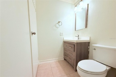Steps from the North Clubhouse, this private and peaceful condo on Kings Point Executive Golf Course in Florida - for sale on GolfHomes.com, golf home, golf lot