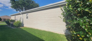 MOVE IN READY - UPGRADED - TURNKEY -GOLF CART INCLUDED- NO BOND on The Links of Spruce Creek in Florida - for sale on GolfHomes.com, golf home, golf lot