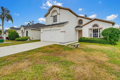 Don't miss this gorgeous two story home -- walking distance to on Binks Forest Golf Club in Florida - for sale on GolfHomes.com, golf home, golf lot