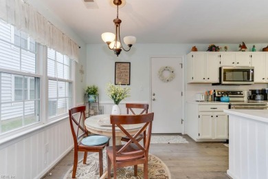Beautiful end-unit condo with golf course views! This move-in on Greenbrier Country Club in Virginia - for sale on GolfHomes.com, golf home, golf lot