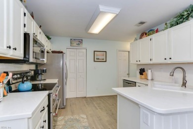 Beautiful end-unit condo with golf course views! This move-in on Greenbrier Country Club in Virginia - for sale on GolfHomes.com, golf home, golf lot
