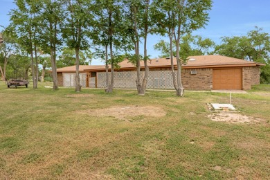 Great tree-shaded home in Lake Tanglewood. Featuring 3 bedrooms on Lake Tanglewood Golf Course in Texas - for sale on GolfHomes.com, golf home, golf lot