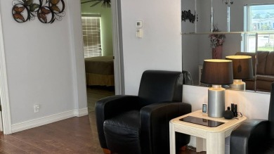 This home has so much to offer!  Pull up to an extended driveway on Sabal Springs Golf and Racquet Club in Florida - for sale on GolfHomes.com, golf home, golf lot