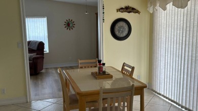 This home has so much to offer!  Pull up to an extended driveway on Sabal Springs Golf and Racquet Club in Florida - for sale on GolfHomes.com, golf home, golf lot