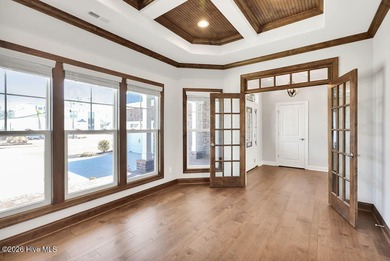 Live the Carolina dream in this all-brick Trusst home perfectly on Compass Pointe Golf Course in North Carolina - for sale on GolfHomes.com, golf home, golf lot